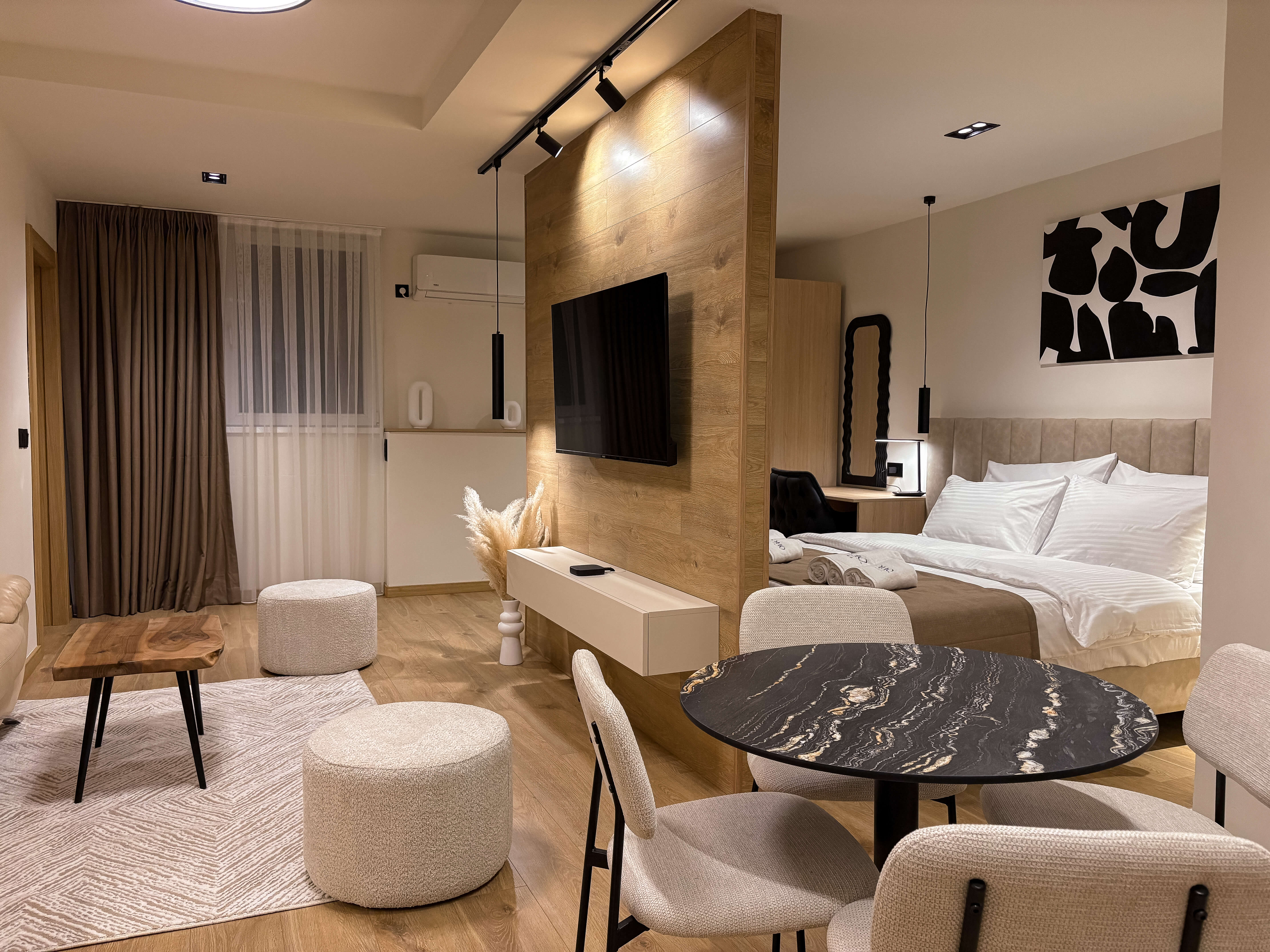 Soho Suites — minimalist luxury interior in Skopje Center